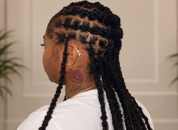 Retwist with two-strand styled locs