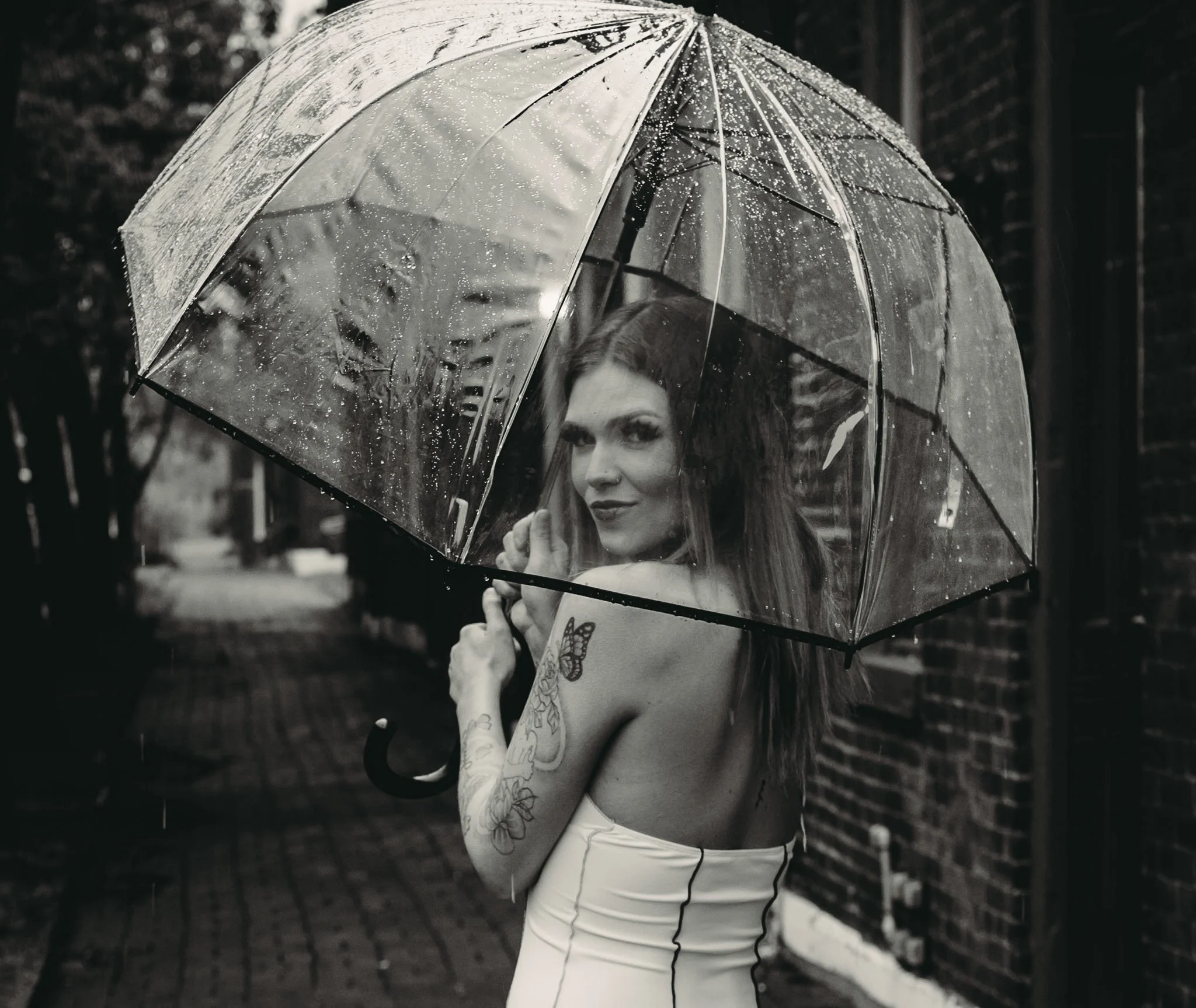 a woman out in the rain