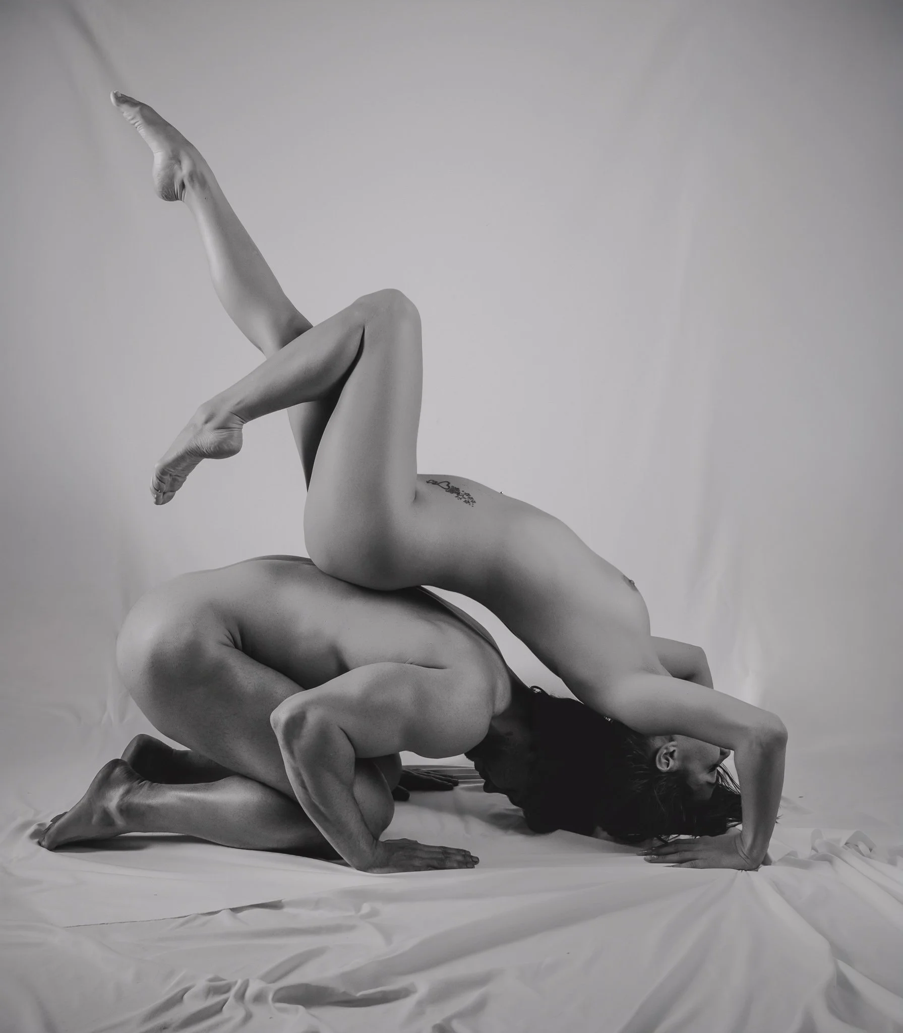 nude man and woman in a fine art pose