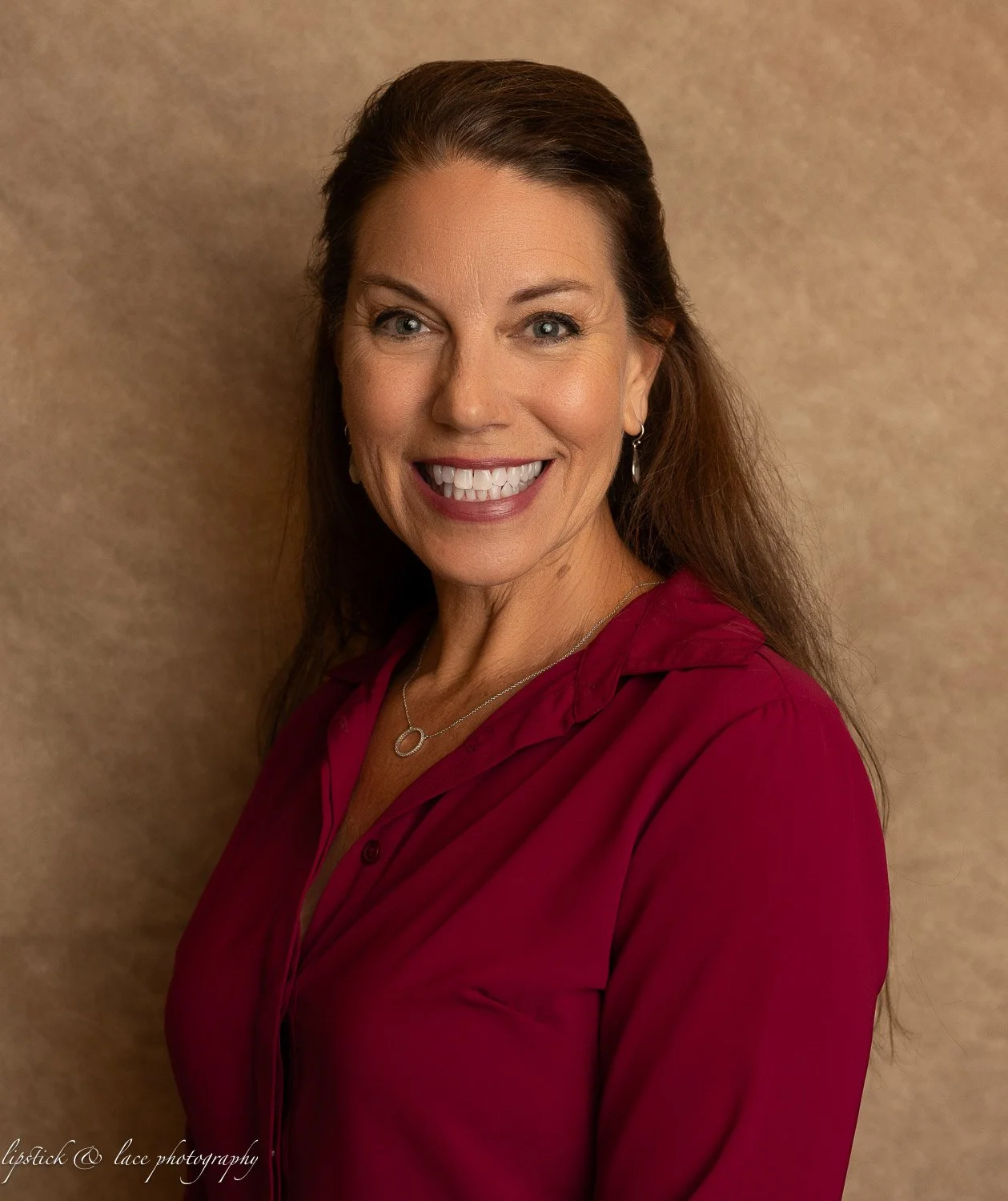 Headshot of a middle aged professional woman
