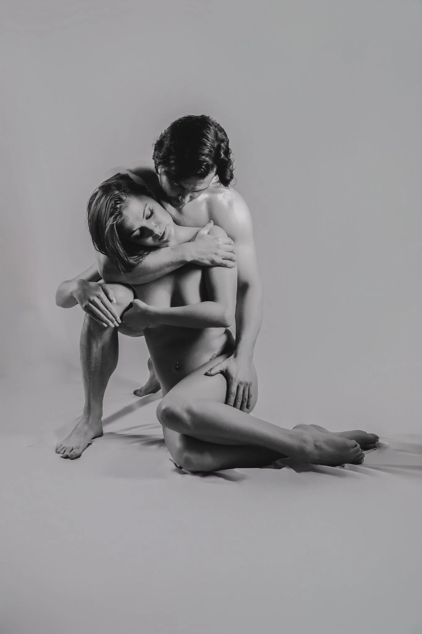 fine art nude of man and woman in black and white