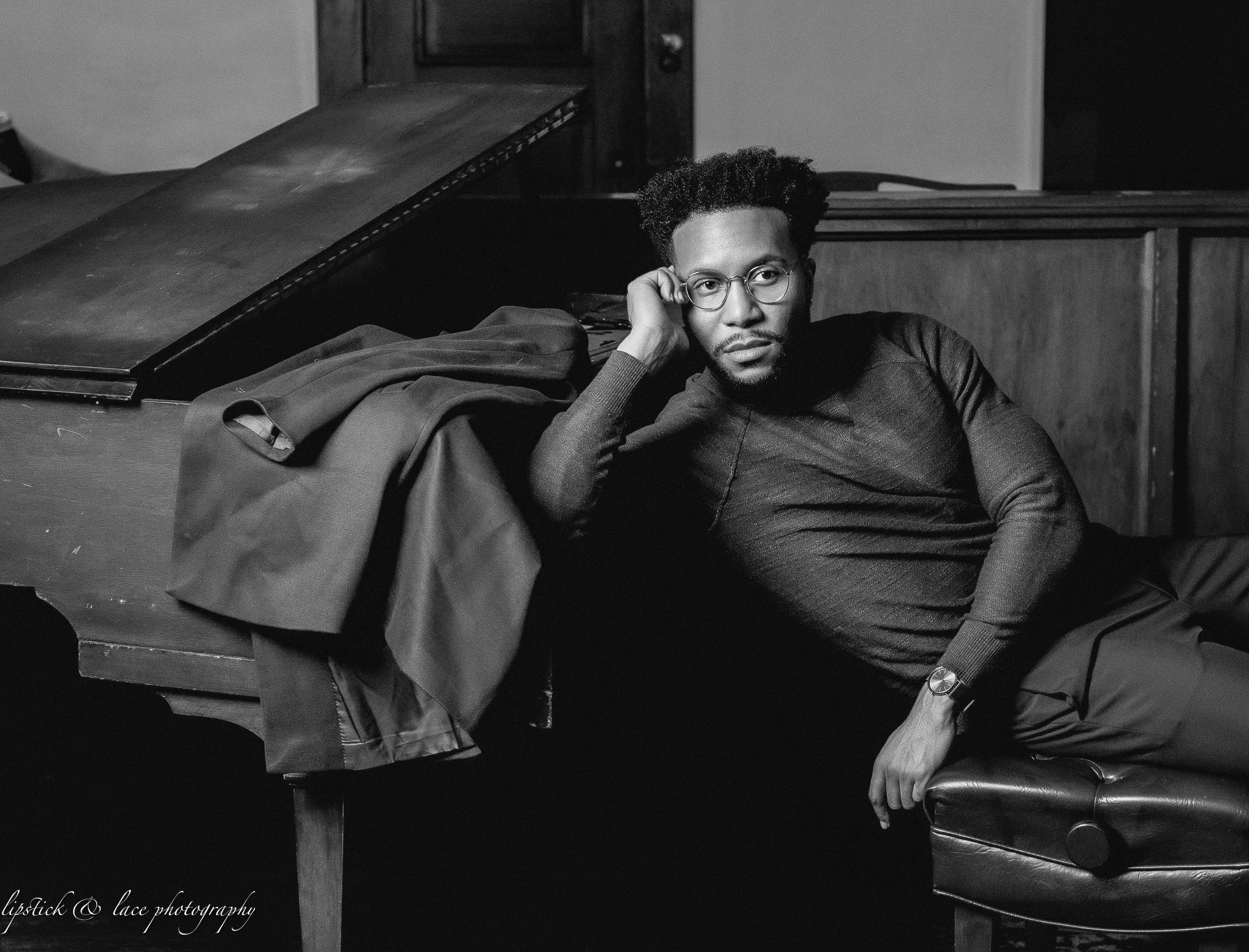 handsome musician sitting at piano