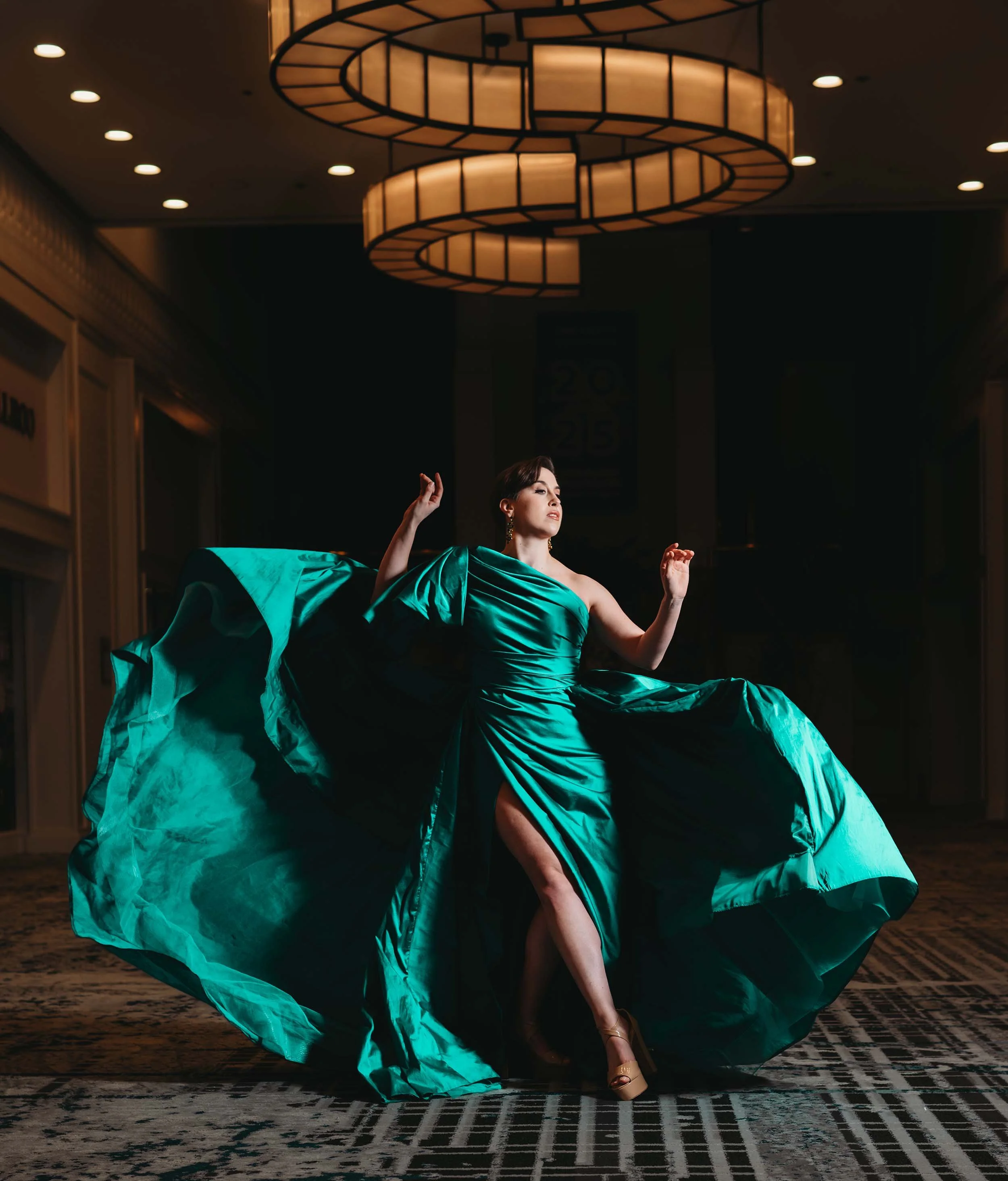 woman in flowing green gown