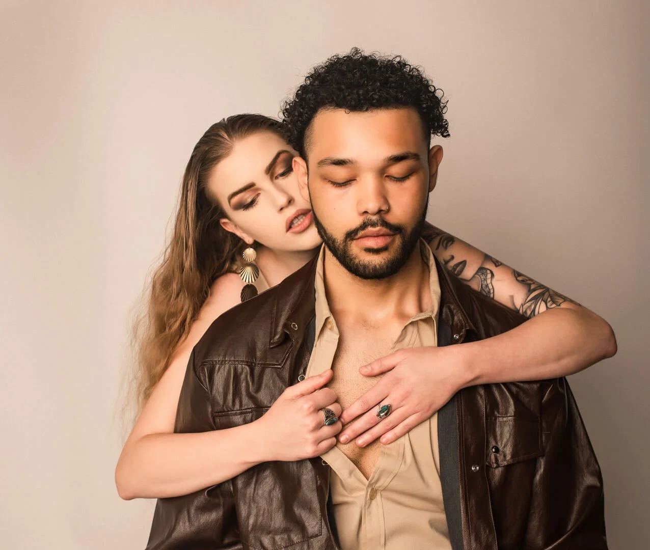 young woman and man in loving embrace