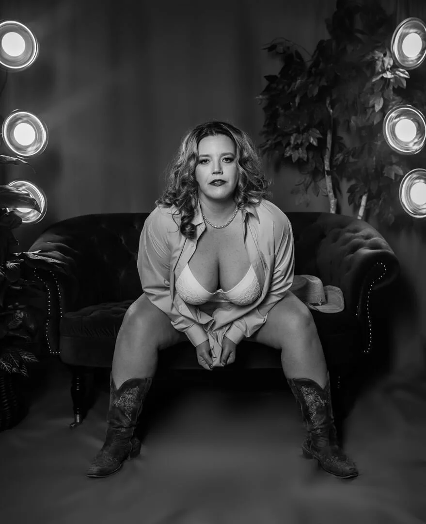 woman wearing lingerie and cowboy boots