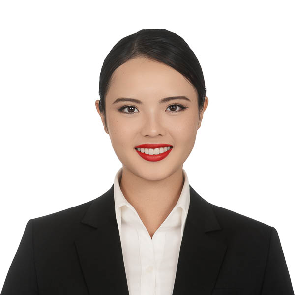 Express studio headshot against a soft neutral background
