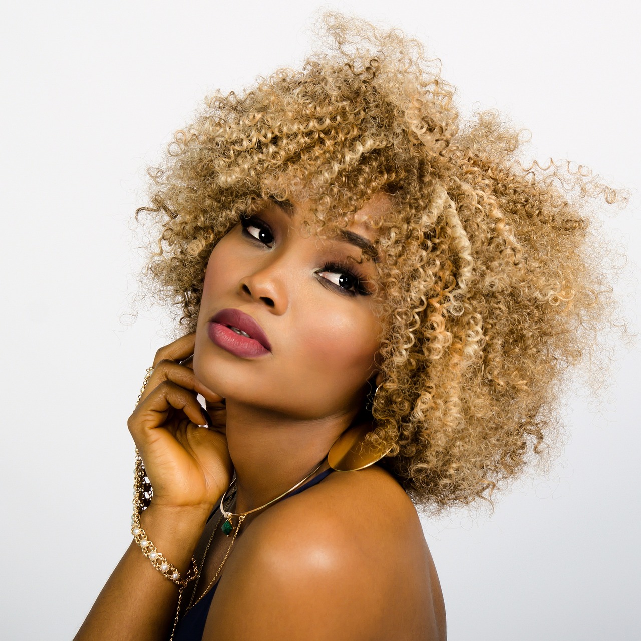 Female wearing yellow gold