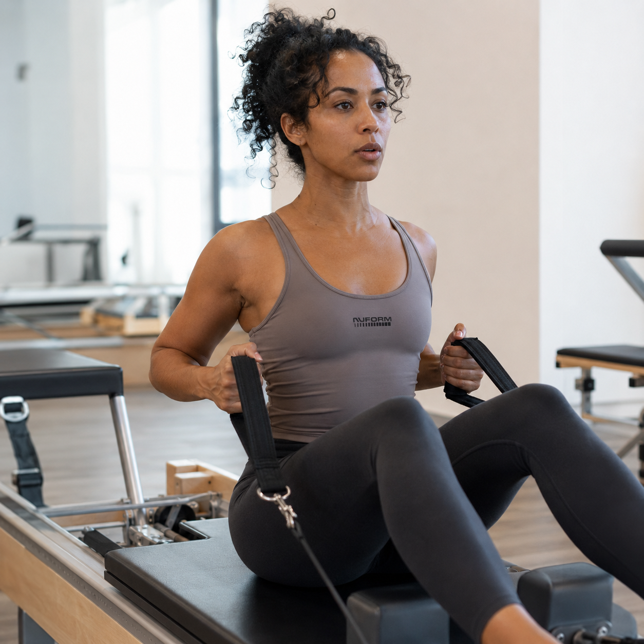 Woman doing pilates, women's hormone health