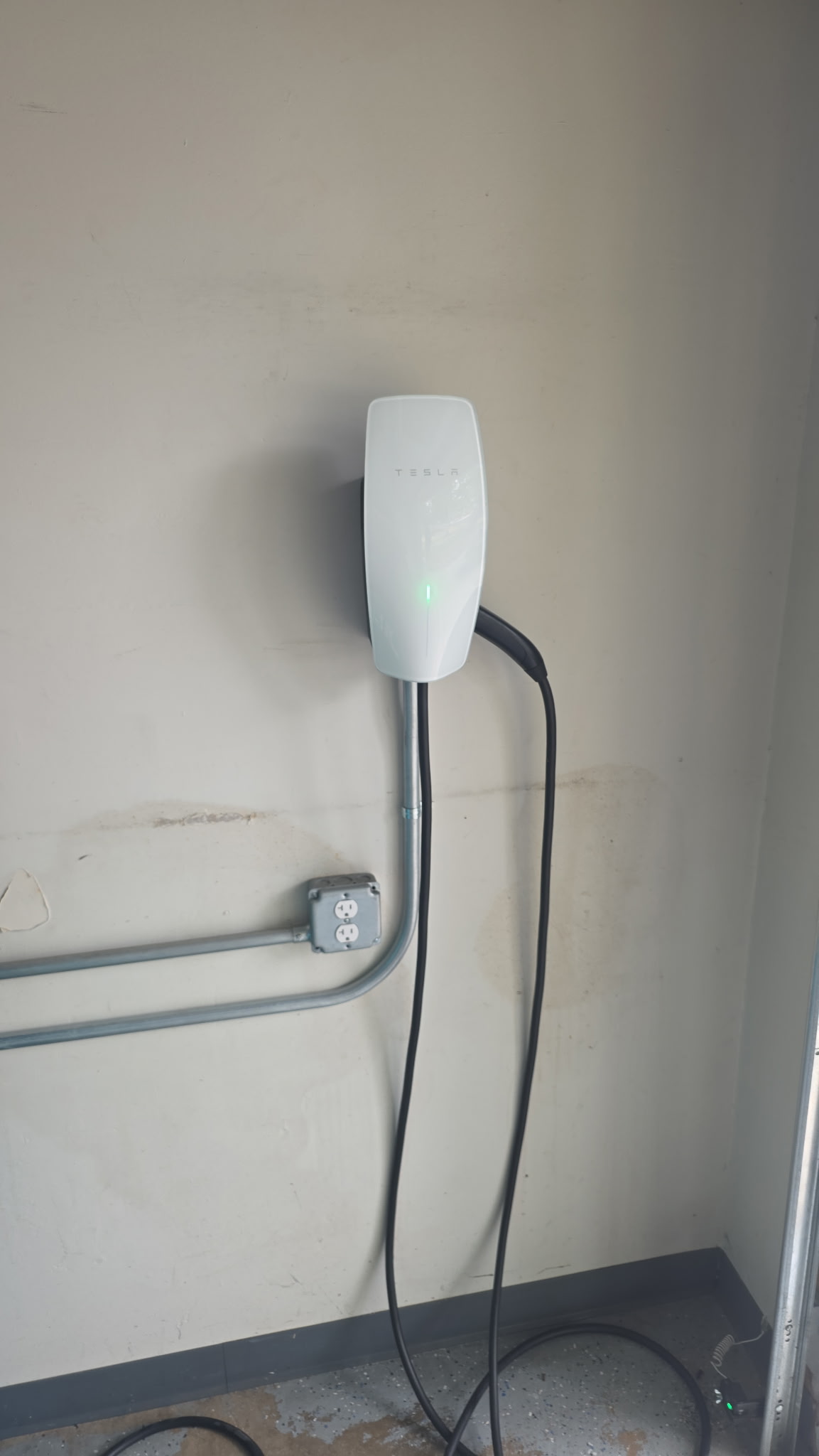 Tesla Wall Connector installed in a Northern Colorado garage