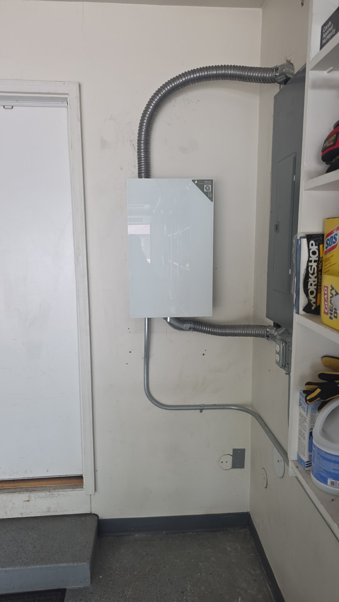 Clean conduit wiring for a Tesla charger installation