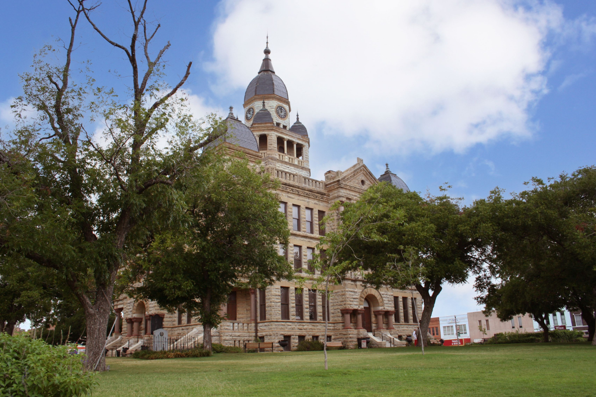 Downtown Denton Square with the historic Denton County Courthouse and surrounding local businesses