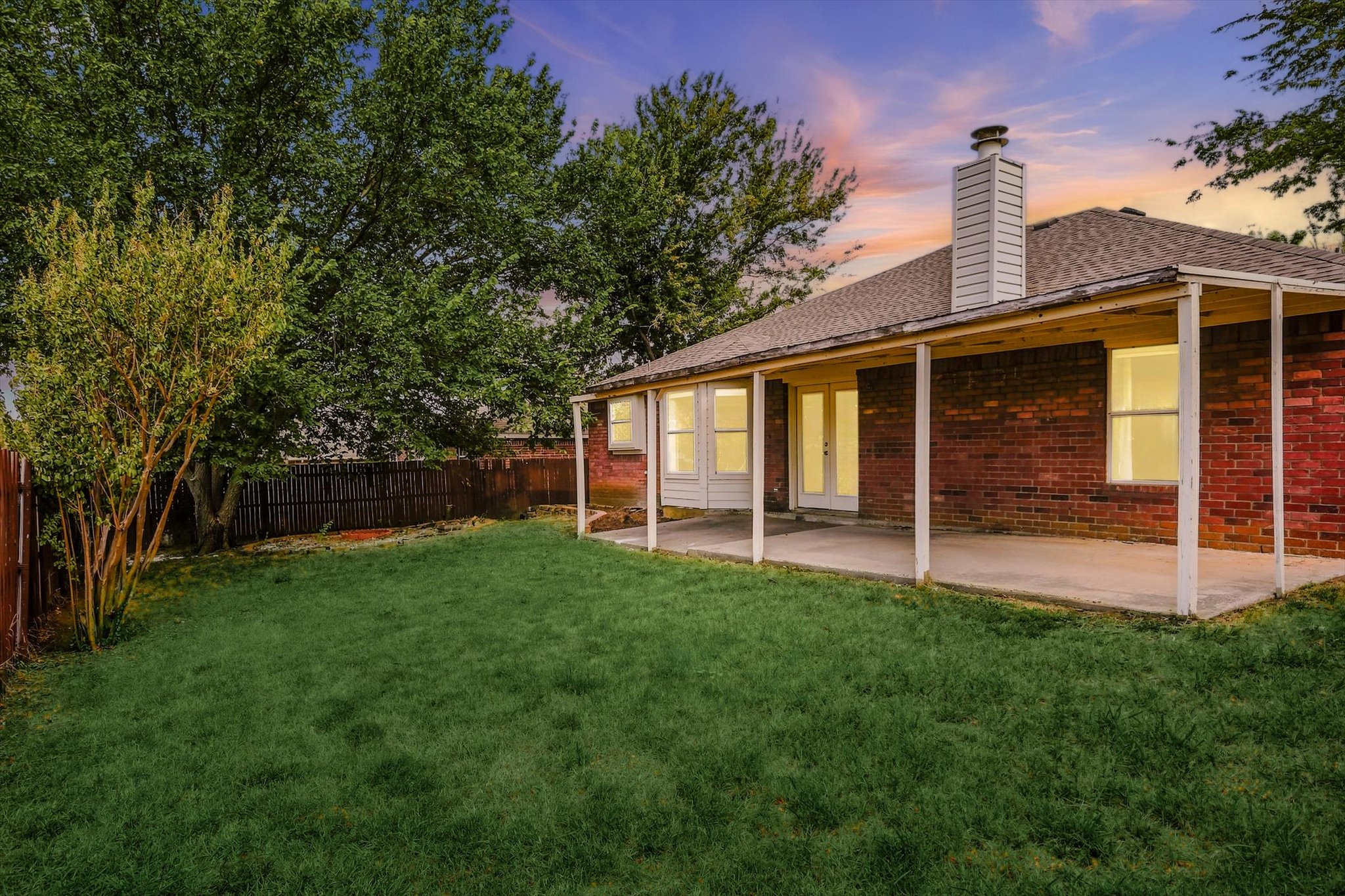 Private backyard with no rear neighbors at 208 Cory Court in Krum, Texas