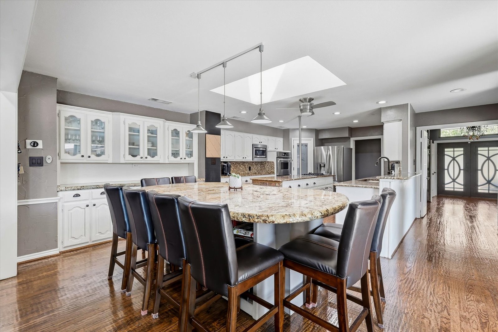Open connection between the kitchen and living areas designed for everyday entertaining