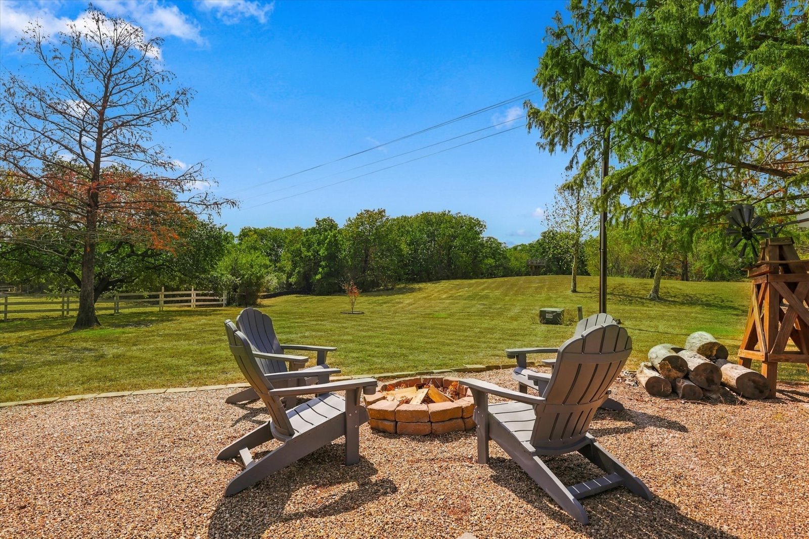 Backyard firepit and gathering area on the two-acre Flower Mound property