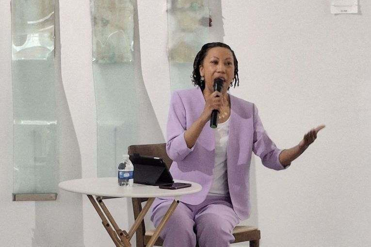 Rosalyn Bates speaking at an event
