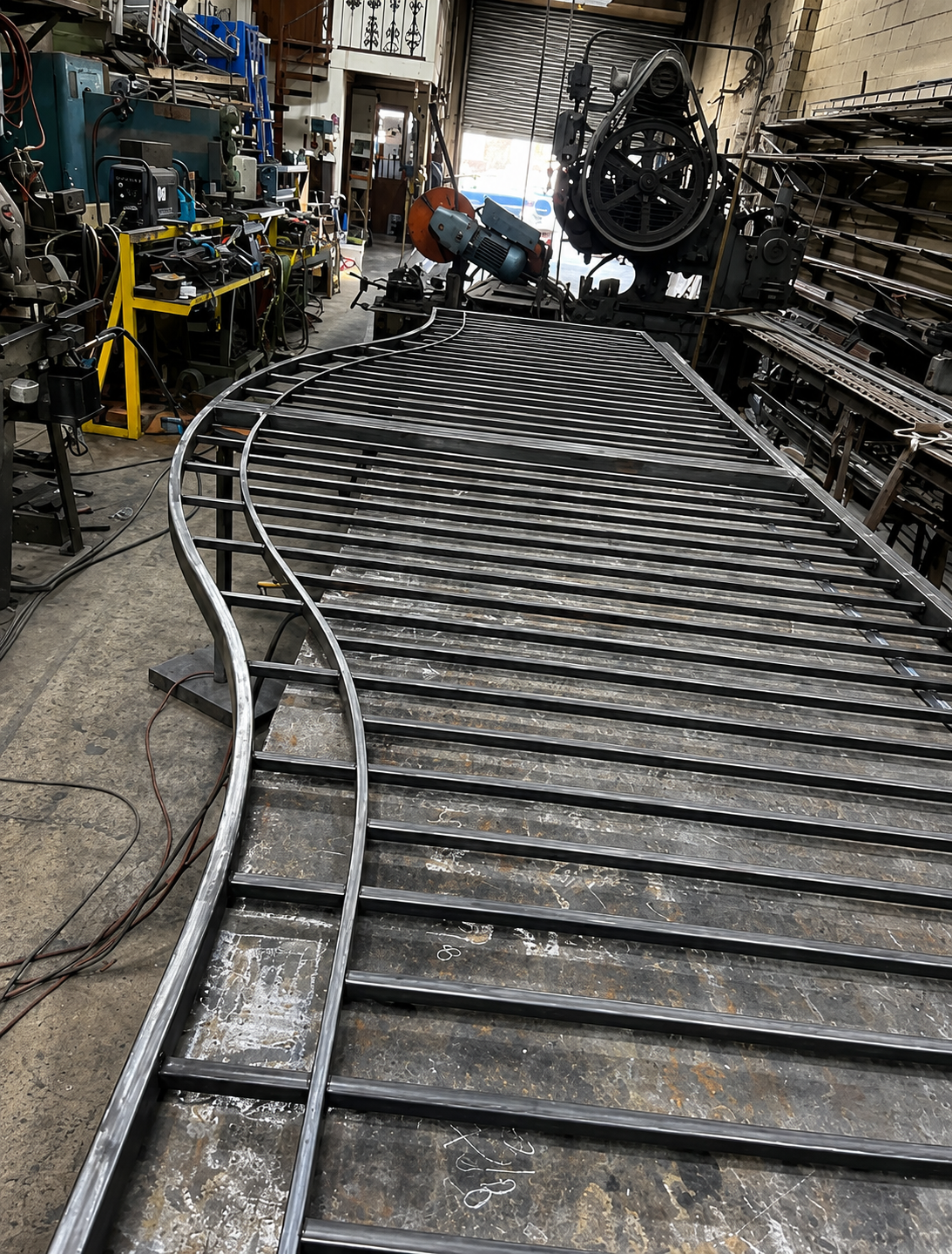 Fabrication of driveway gates at the Paterson Iron Works shop