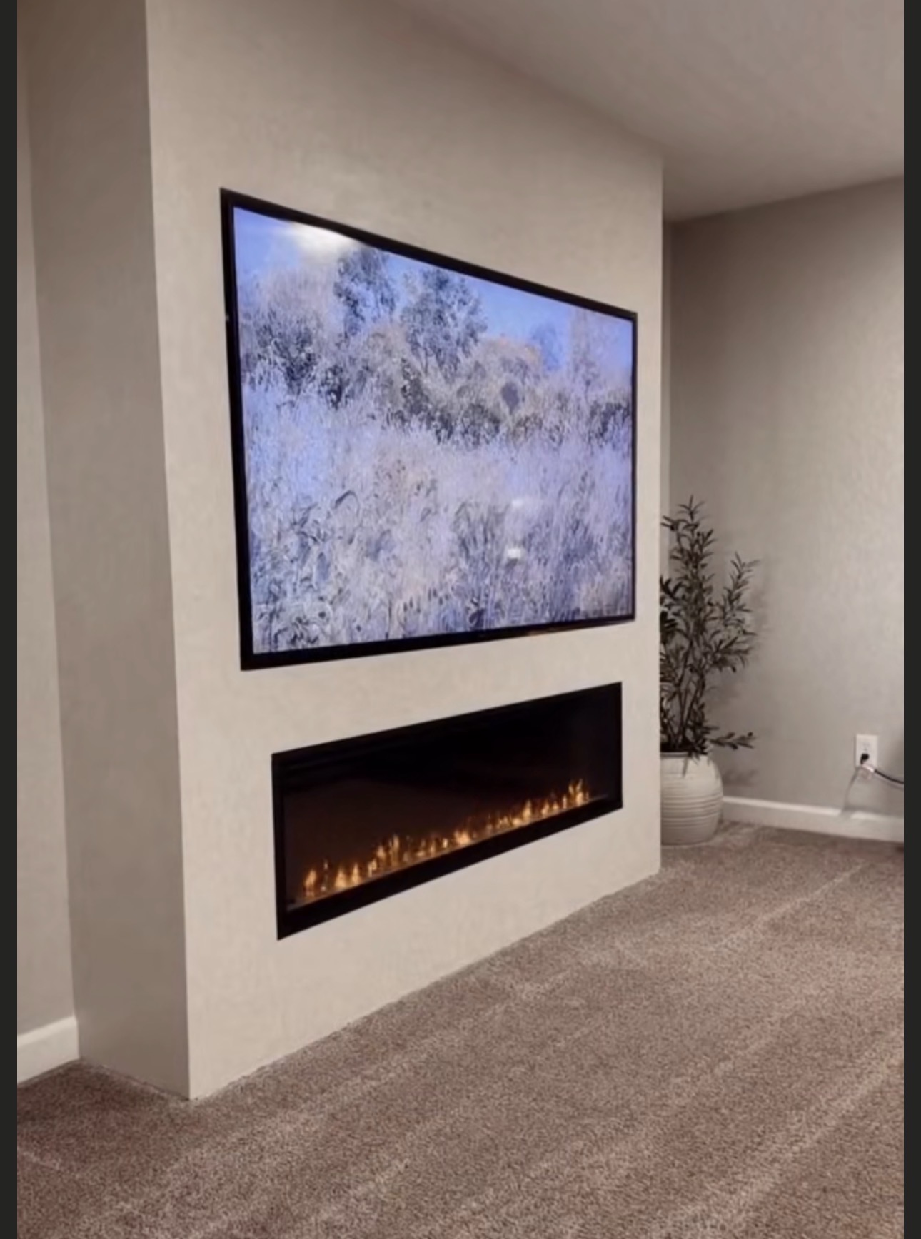 Custom fireplace surround by Artisan Tile and Remodeling