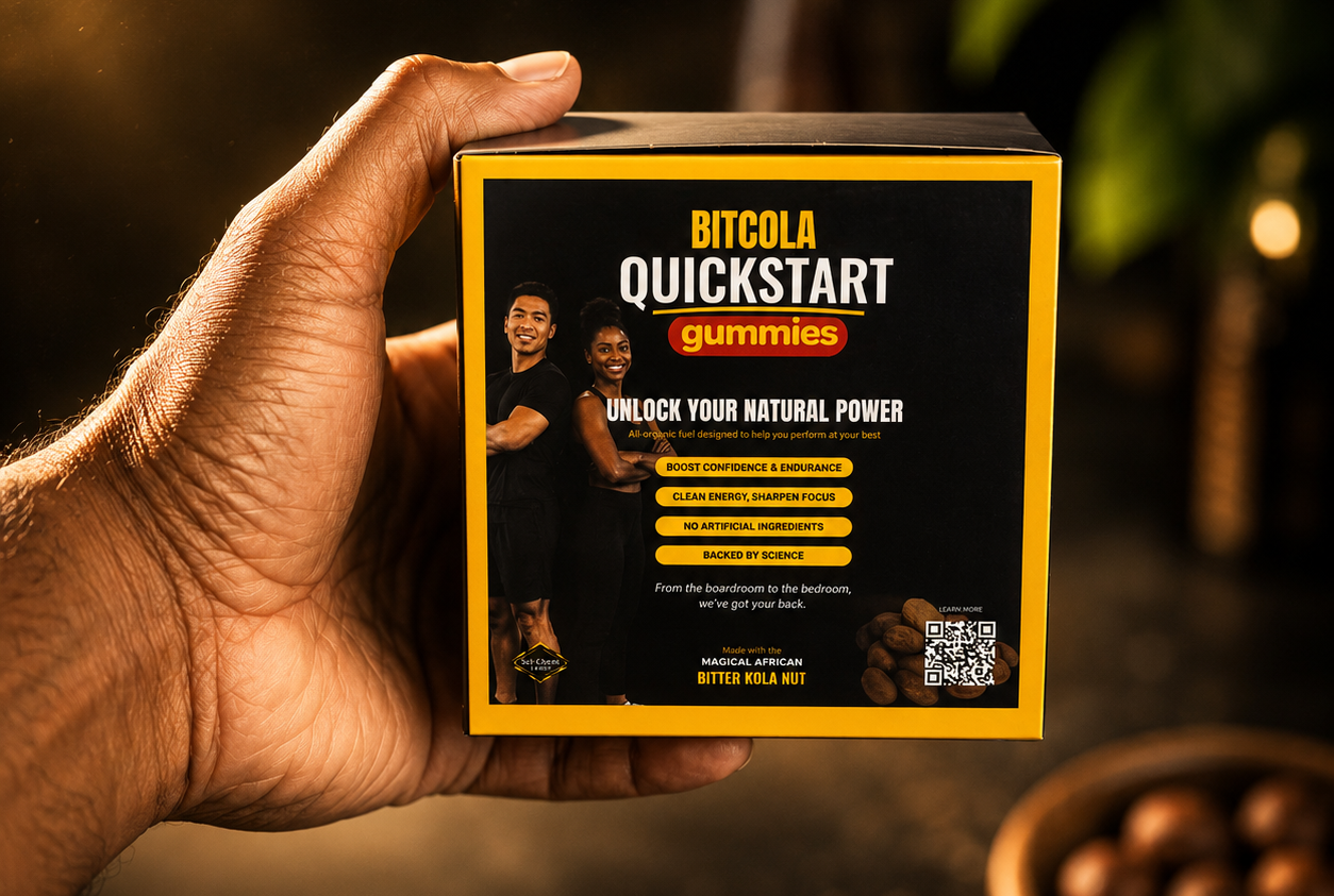 Hand holding a box of BITCOLA QuickStart Gummies.