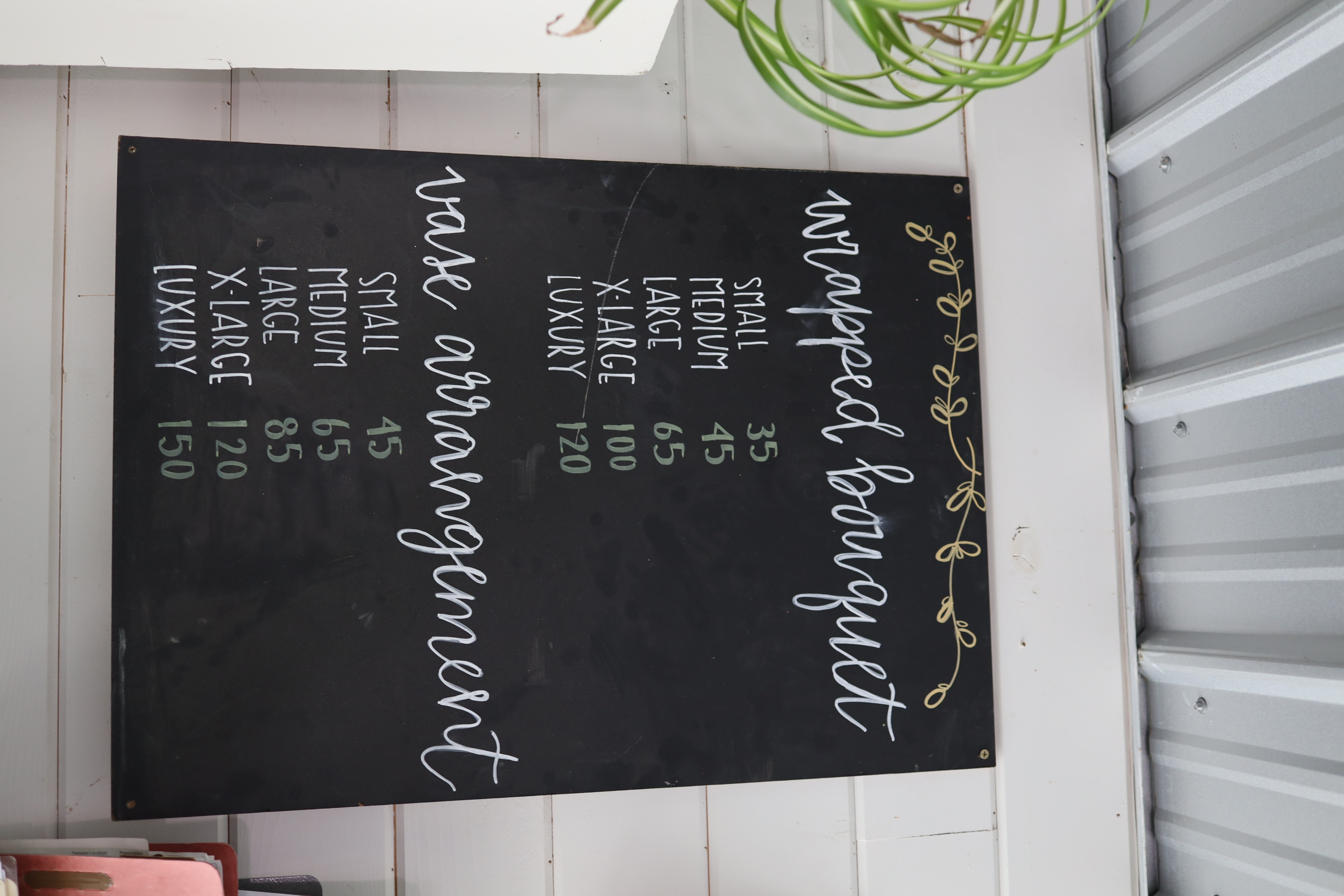 Chalkboard pricing at the farm stand