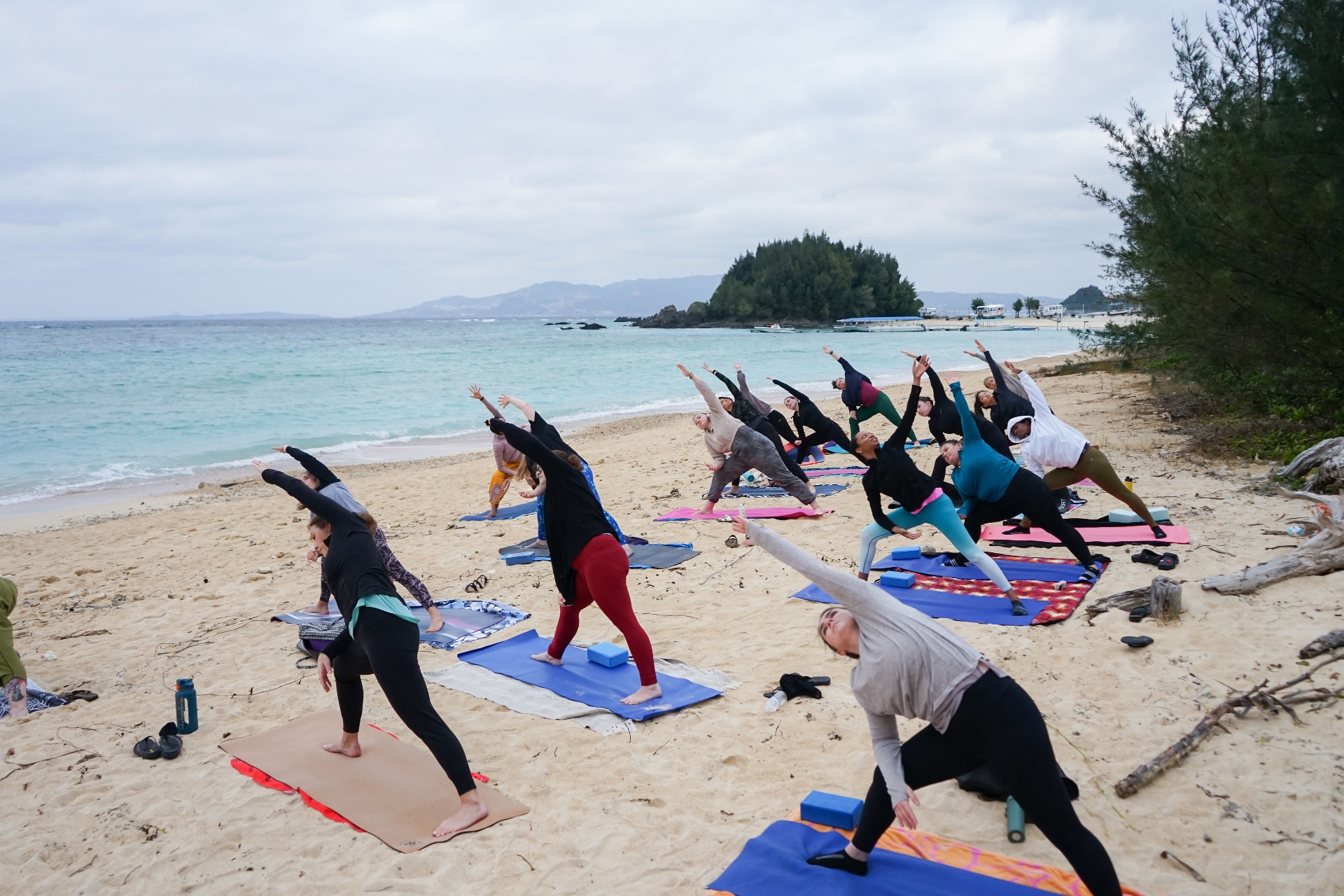 Beach yoga session during retreat