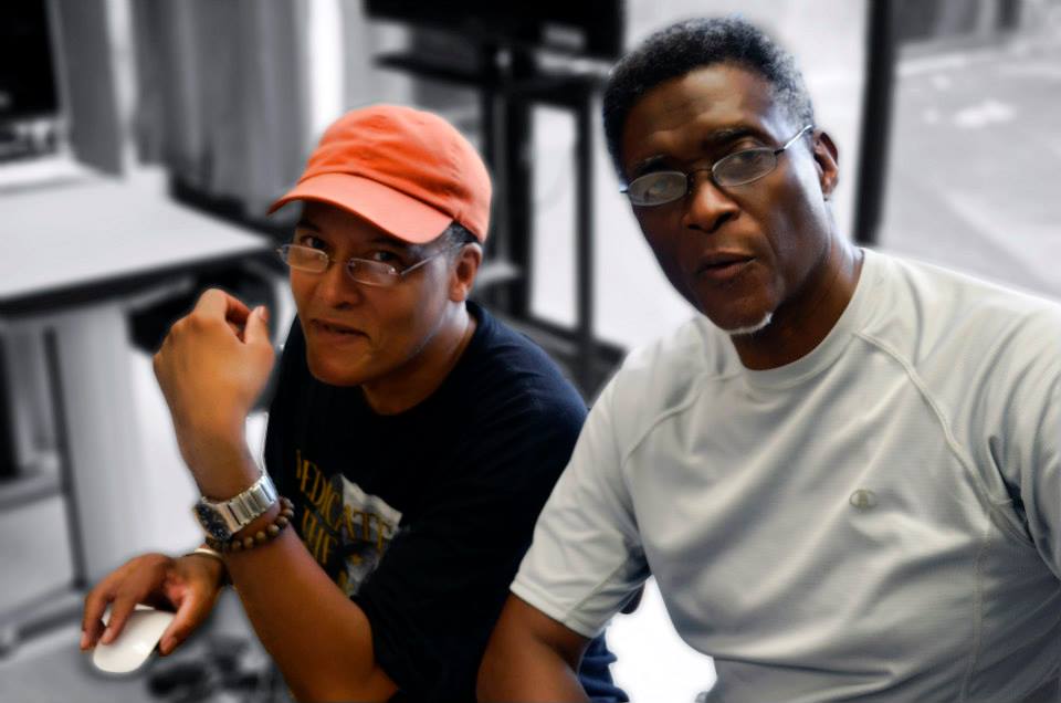 Founder and creative director of EVT Educational Productions collaborating during a media production session