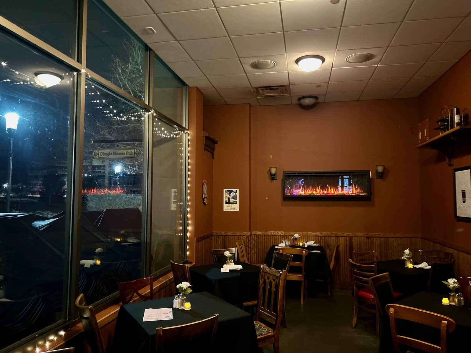 Dining room by the front windows at night