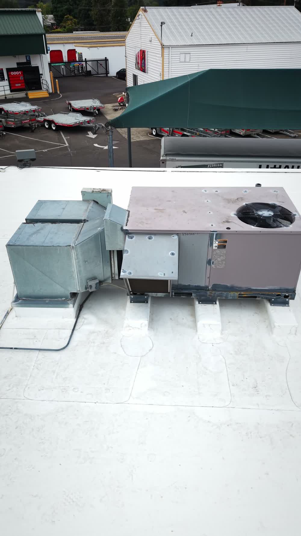 Roof membrane and flashing around rooftop equipment at the U-Haul project