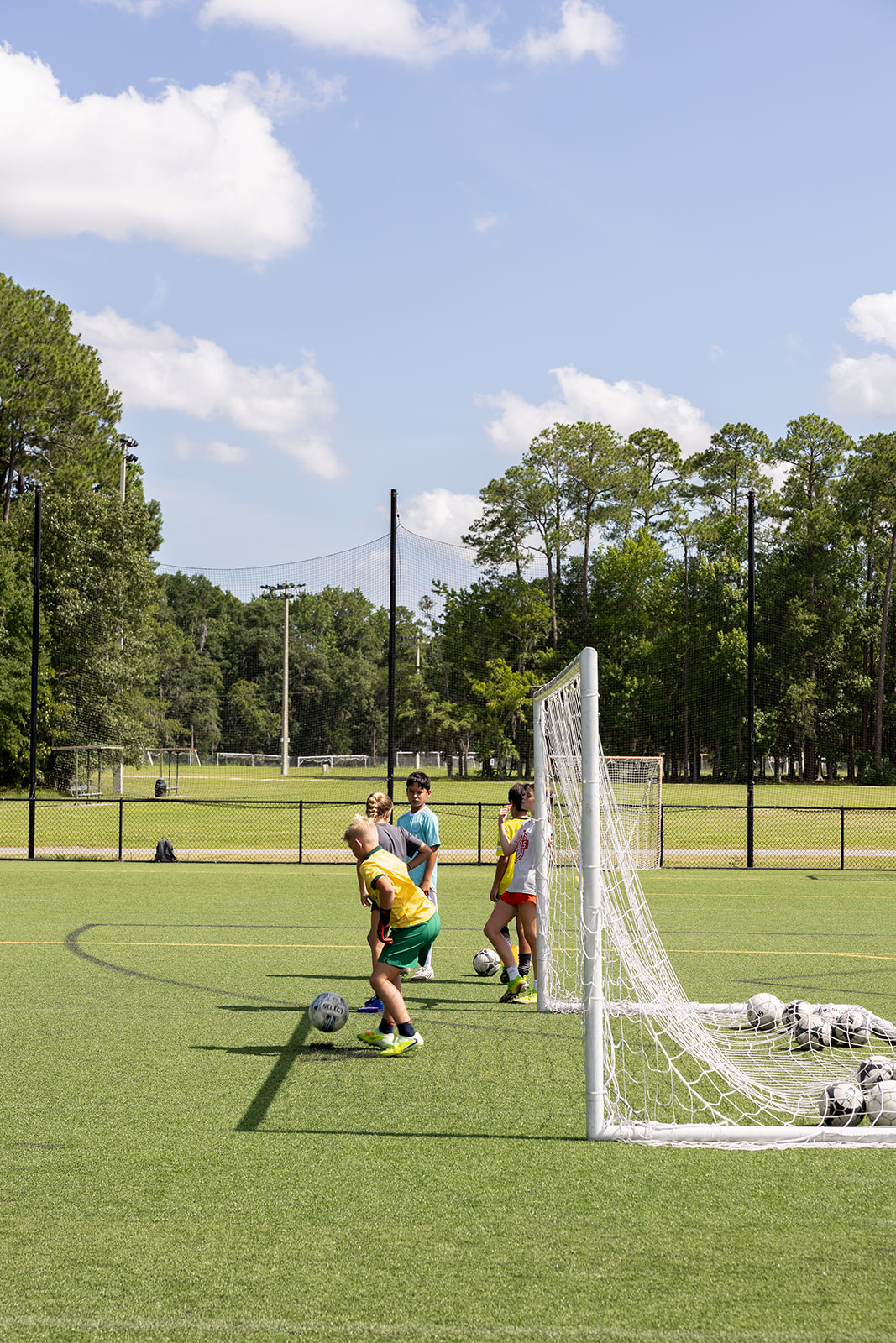 Small group competitive training at a SkillMill Soccer clinic