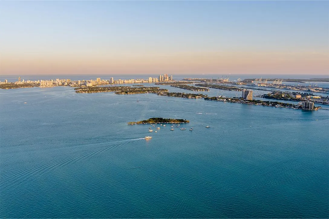 Islands scattered across calm bay water