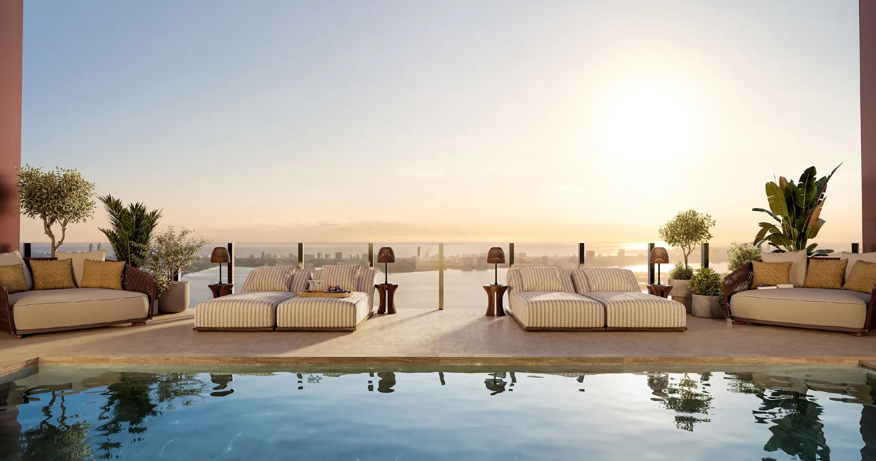 Rooftop pool and seating at golden hour
