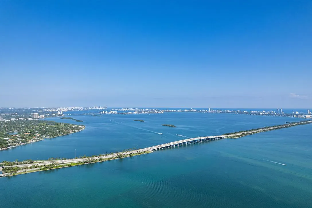 Biscayne Bay and a causeway under a clear blue sky