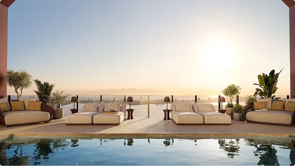 Pool terrace at sunset with daybeds