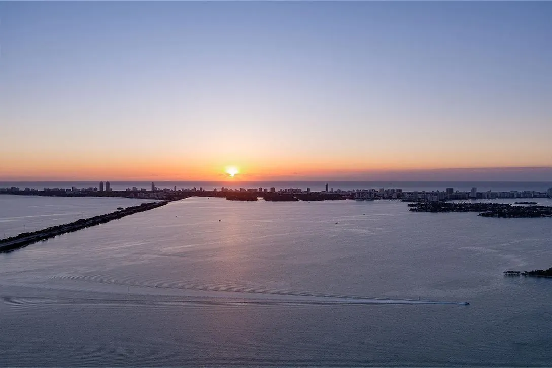 The sun setting over the bay