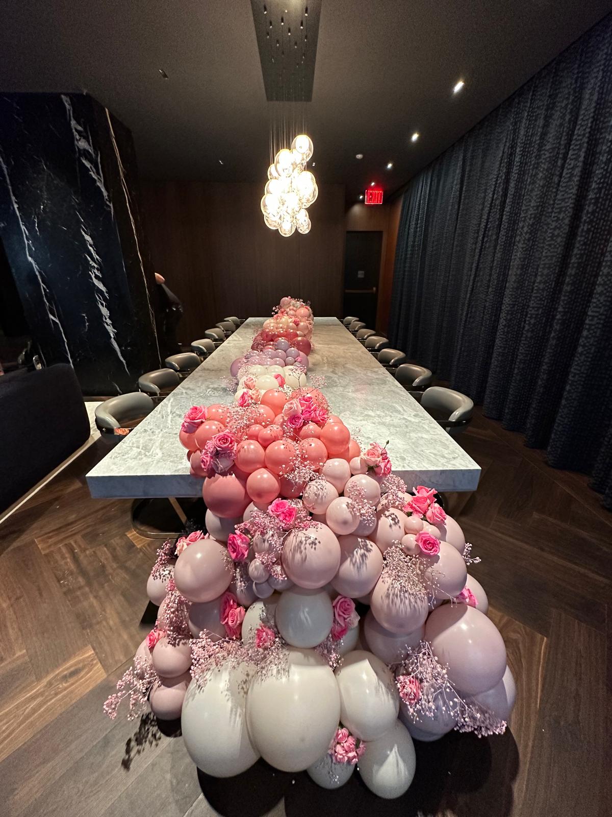 Blush garden rose balloon garland tablescape