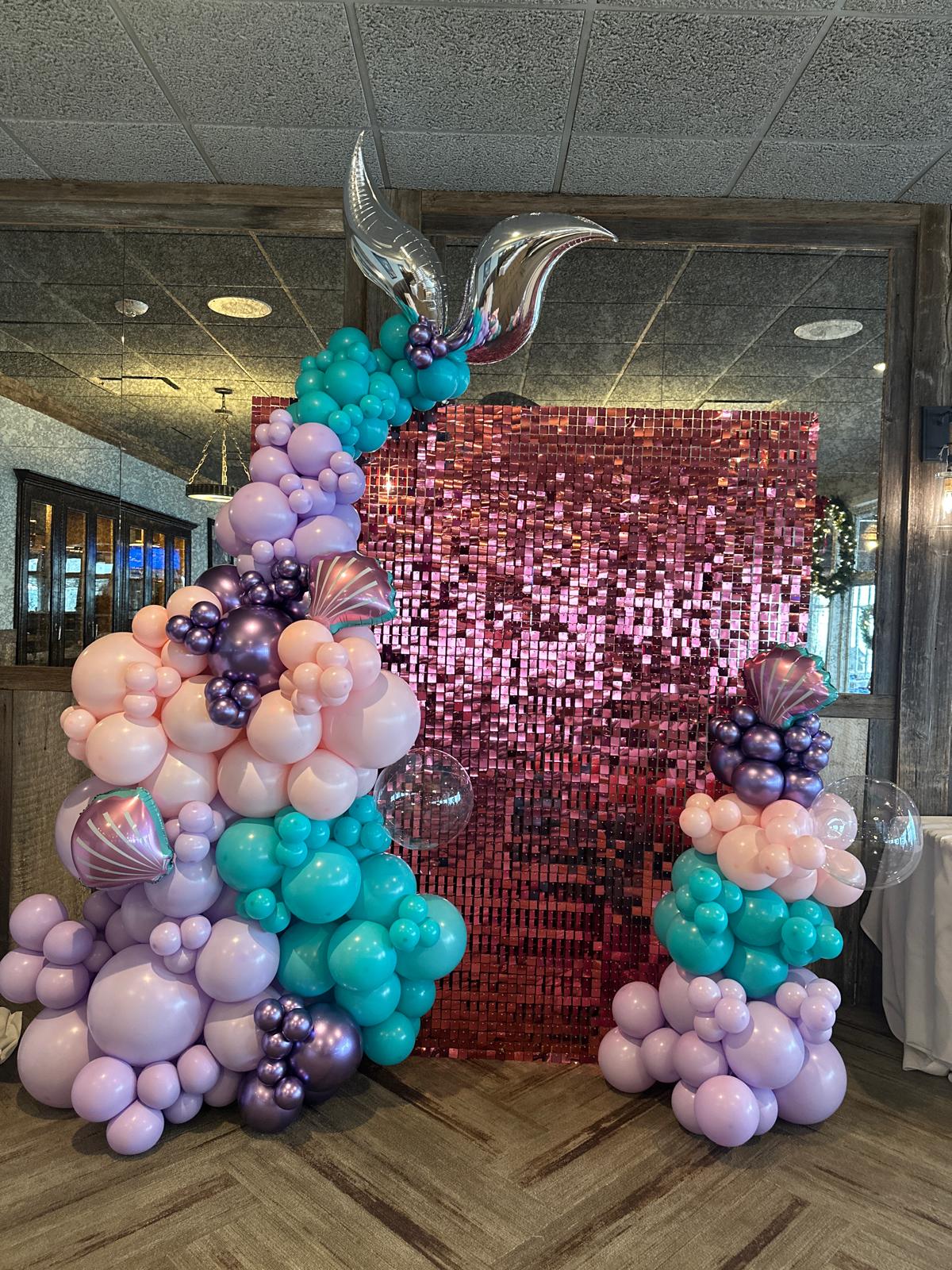 Mermaid themed balloon garland installation