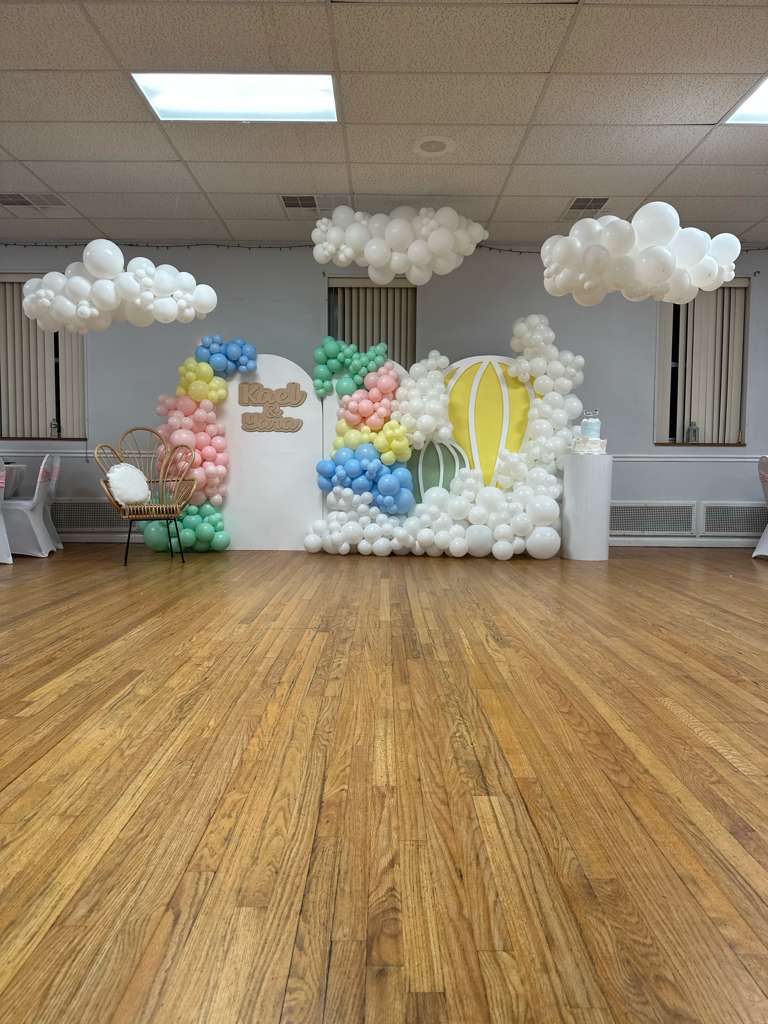 Pastel cloud and hot air balloon themed backdrop