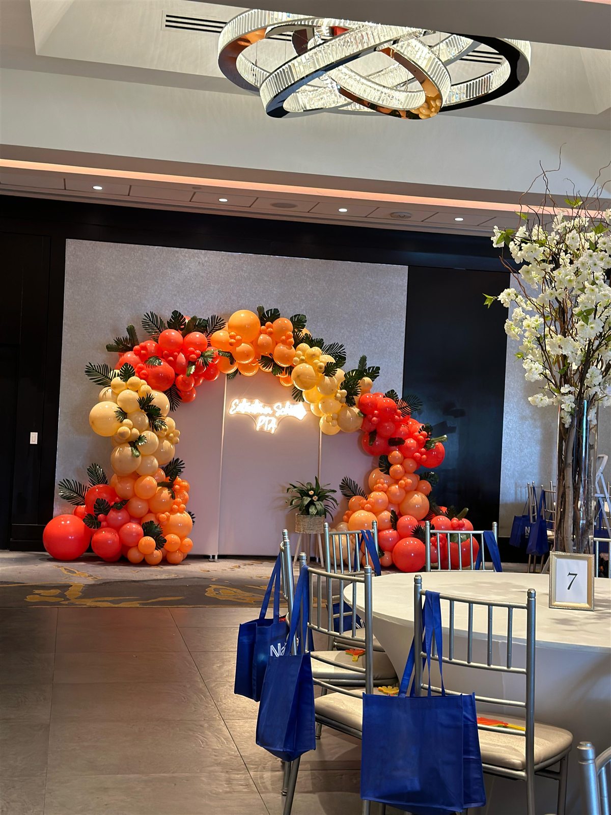 Orange Balloon Cluster at a VIP Creations event
