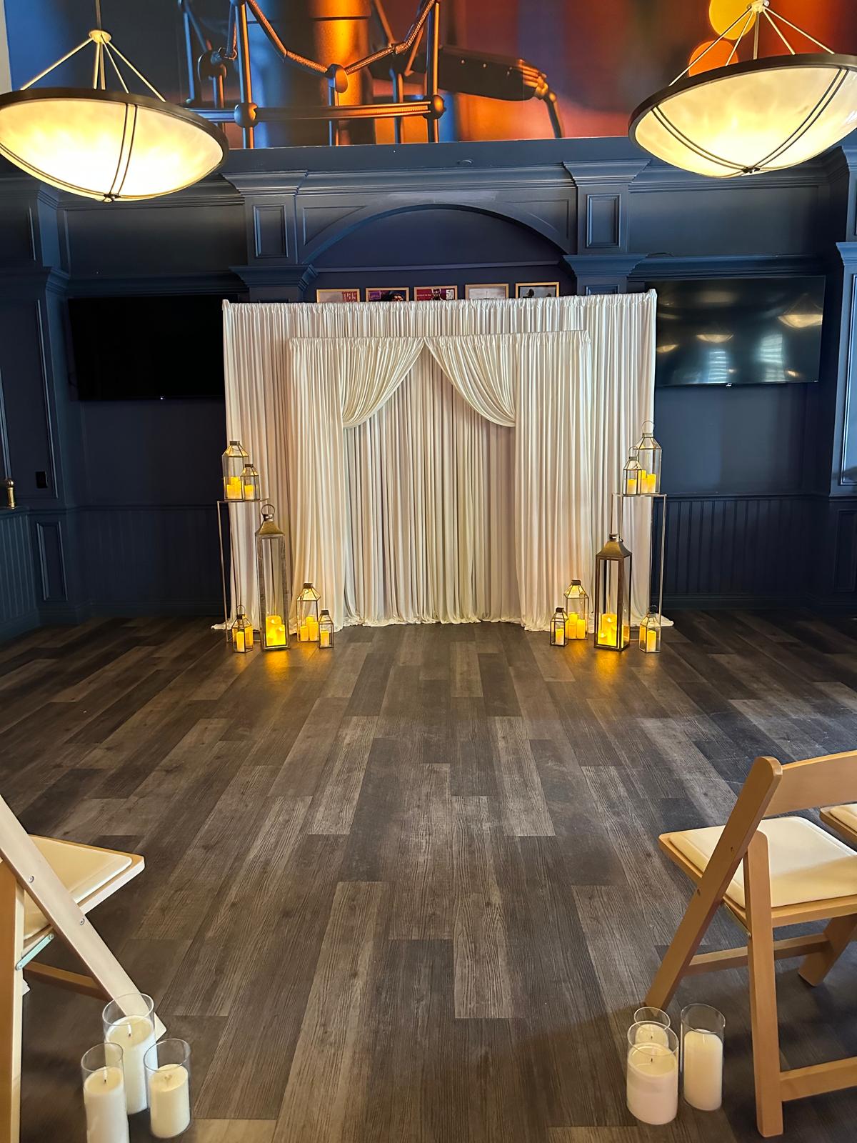 Curtain Backdrop at a VIP Creations event