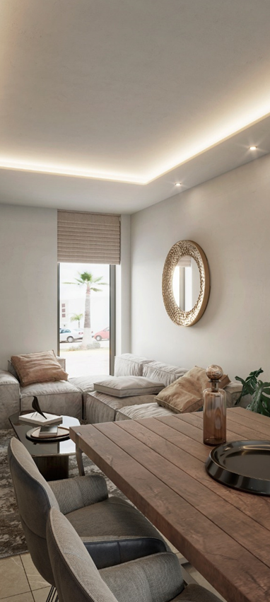 Sala de estar con diseno contemporaneo, iluminacion calida y acabados de madera