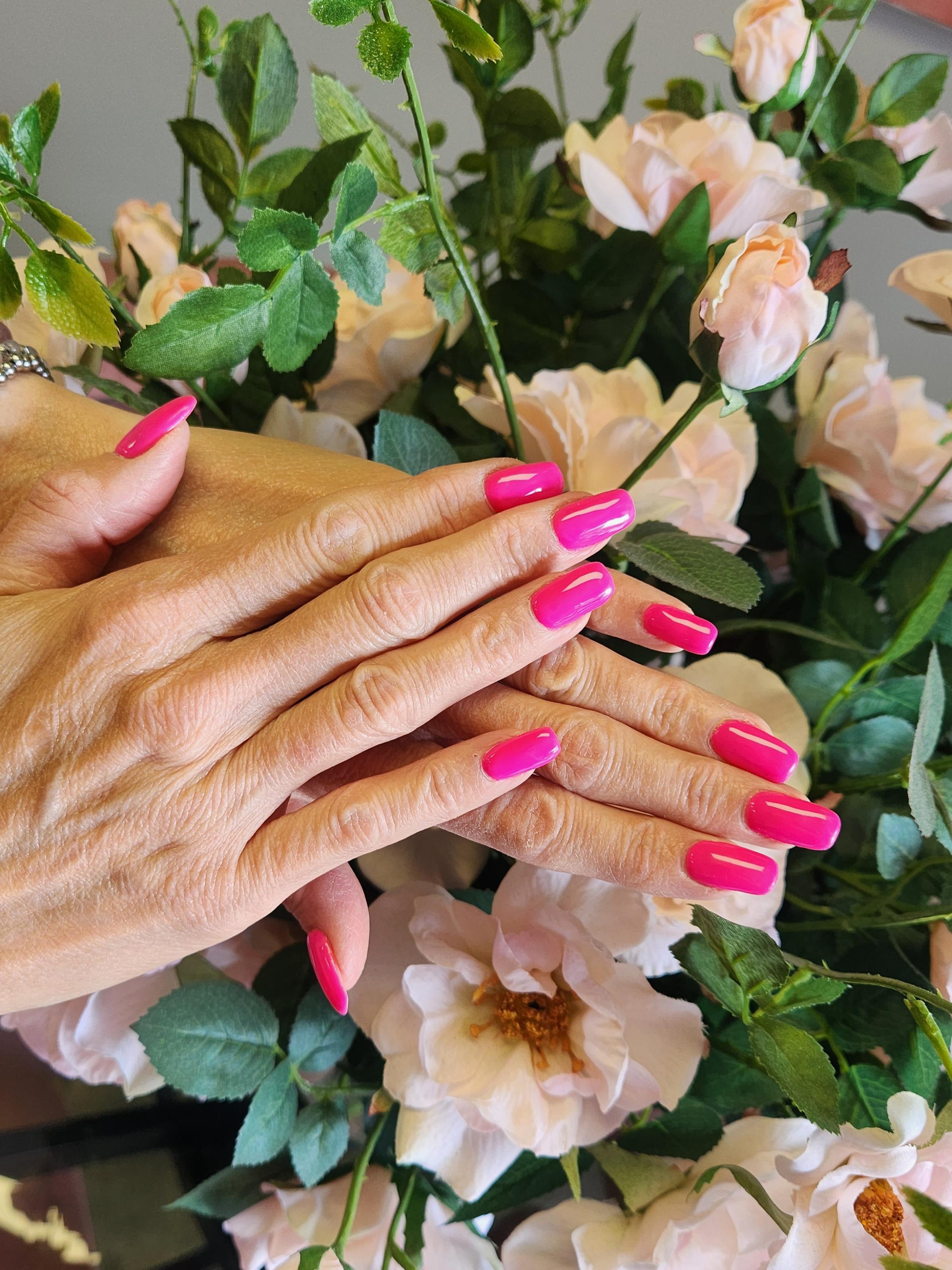 Bright pink glossy nail finish by Craft Hair & Beauty
