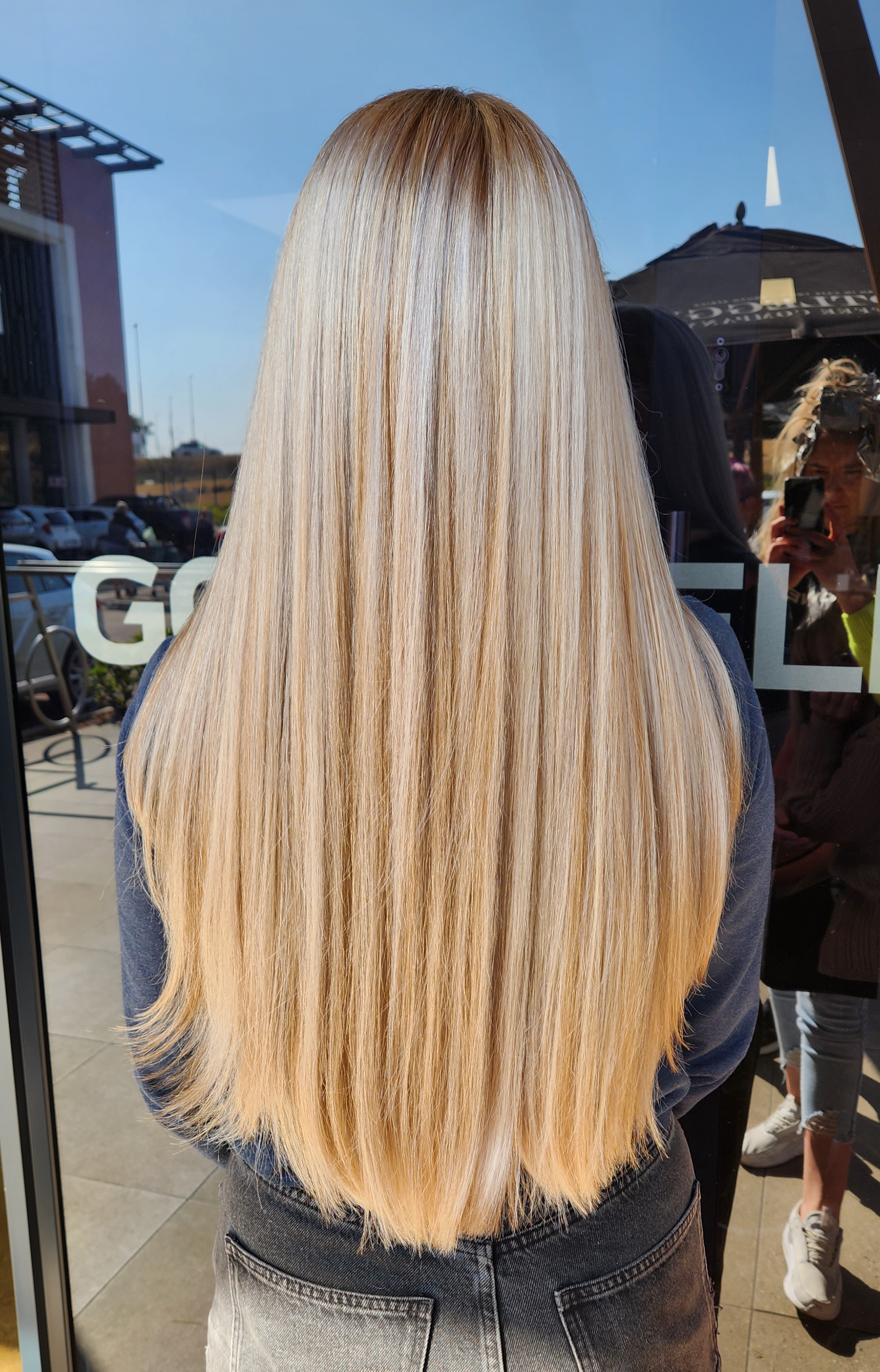 Long sleek blonde styling created at Craft Hair & Beauty in Dainfern