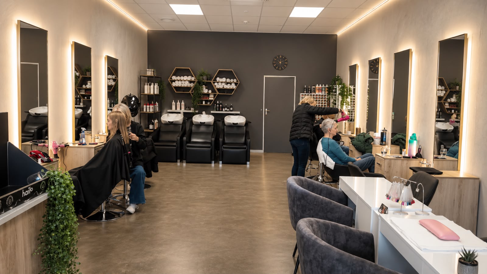 Craft Hair & Beauty salon interior with illuminated mirrors