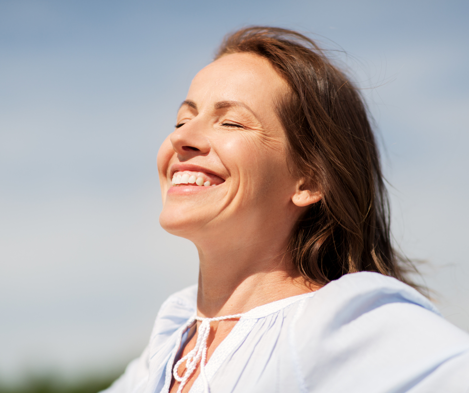 A healthy happy person smiling