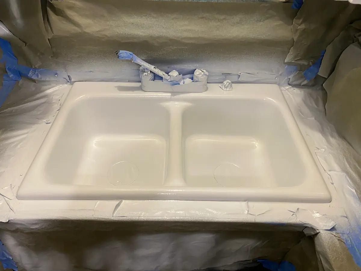Peeling kitchen sink before resurfacing