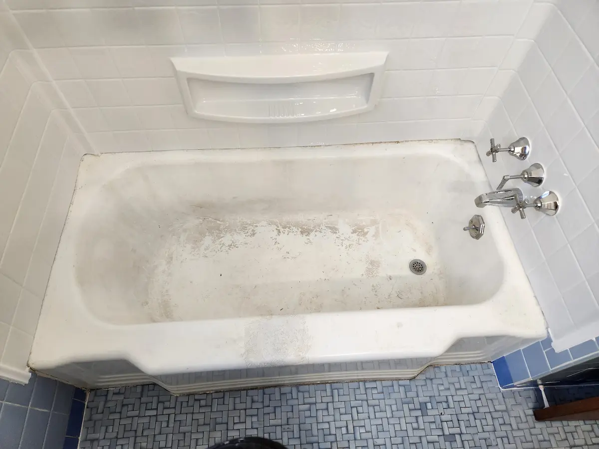 Stained bathtub before reglazing in an Ohio home