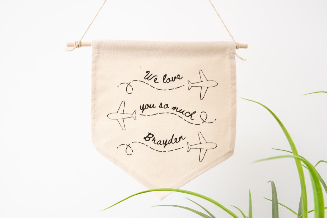 Canva design cut into a Cricut canvas banner