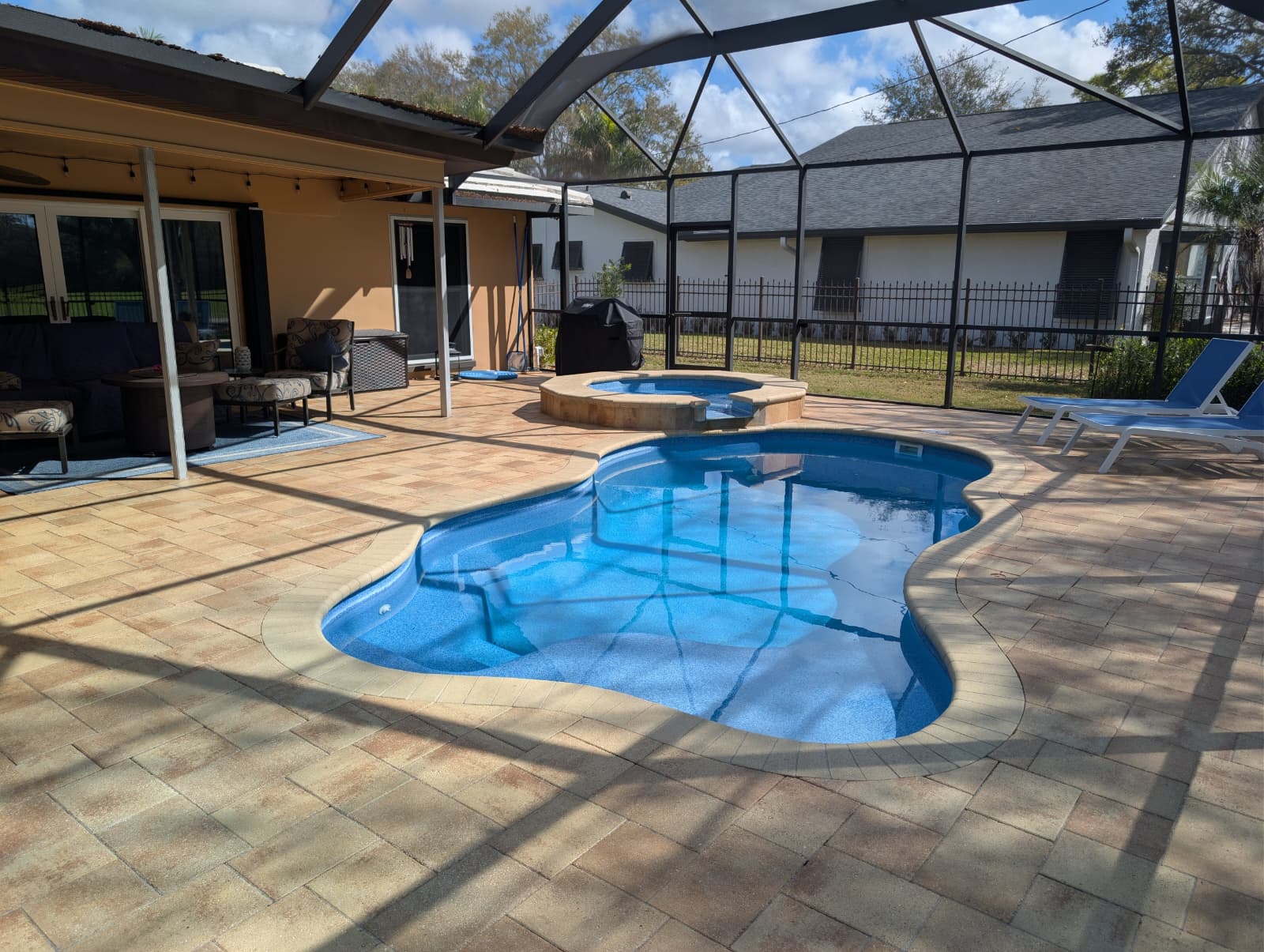 Custom fiberglass pool with deck