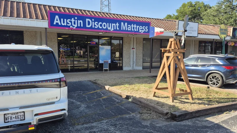 The Austin Discount Mattress storefront at 7208 McNeil Drive in Austin, Texas.