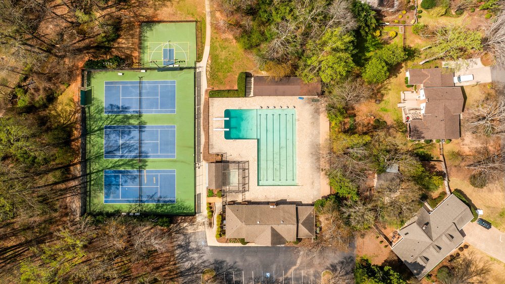 The Forrester Woods pool one block from 219 Oakwood Ct, Greenville SC — tennis courts currently under renovation