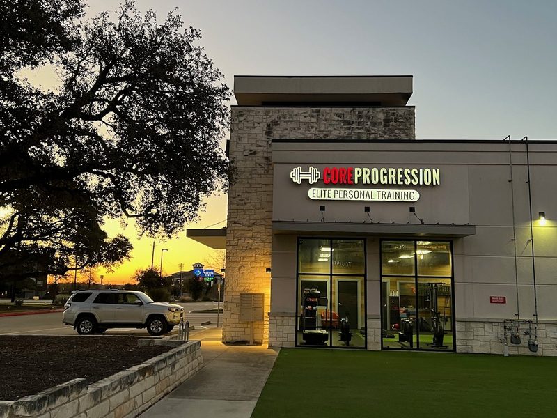 Exterior of Core Progression Elite Personal Training at dusk on N Lake Creek Pkwy, Austin